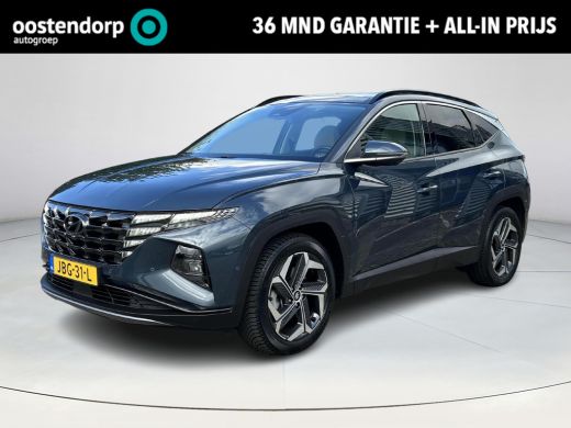 Hyundai Tucson Hybrid 1.6 T-GDI HEV Premium Sky | Stoelverwarming/verkoeling | Stuurverwarming | Schuif-kantel dak | Le... Hyundai Tucson Hybrid 1.6 T-GDI HEV Premium Sky | Stoelverwarming/verkoeling | Stuurverwarming | Schuif-kantel dak | Le...