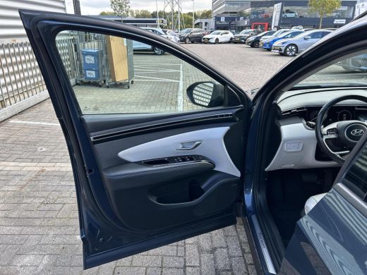 Hyundai Tucson Hybrid 1.6 T-GDI HEV Premium Sky | Stoelverwarming/verkoeling | Stuurverwarming | Schuif-kantel dak | Le... ActivLease financial lease