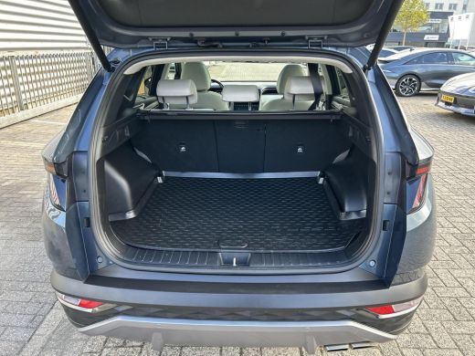 Hyundai Tucson Hybrid 1.6 T-GDI HEV Premium Sky | Stoelverwarming/verkoeling | Stuurverwarming | Schuif-kantel dak | Le... ActivLease financial lease