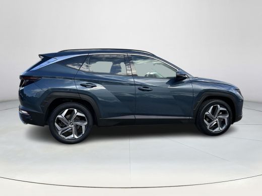 Hyundai Tucson Hybrid 1.6 T-GDI HEV Premium Sky | Stoelverwarming/verkoeling | Stuurverwarming | Schuif-kantel dak | Le... ActivLease financial lease