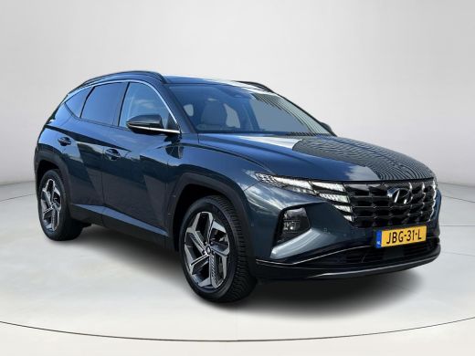 Hyundai Tucson Hybrid 1.6 T-GDI HEV Premium Sky | Stoelverwarming/verkoeling | Stuurverwarming | Schuif-kantel dak | Le... ActivLease financial lease