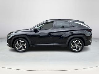 Hyundai Tucson 1.6 T-GDI PHEV Premium Sky 4WD | Rijklaarprijs! | Panoramadak | Stoel & stuurverwarming | Adaptie...