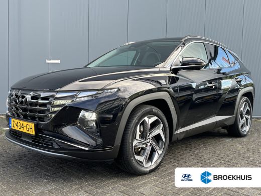Hyundai Tucson 1.6 T-GDI 265pk PHEV Premium 4WD | Leder | Carplay | Climate | Keyless | Navigatie | Elek. Klep |... Hyundai Tucson 1.6 T-GDI 265pk PHEV Premium 4WD | Leder | Carplay | Climate | Keyless | Navigatie | Elek. Klep |...