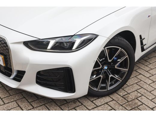 BMW i4 eDrive40 M Sport / Schuif-kanteldak / Achteruitrijcamera / M Adaptief onderstel / Stoelverwarming... ActivLease financial lease