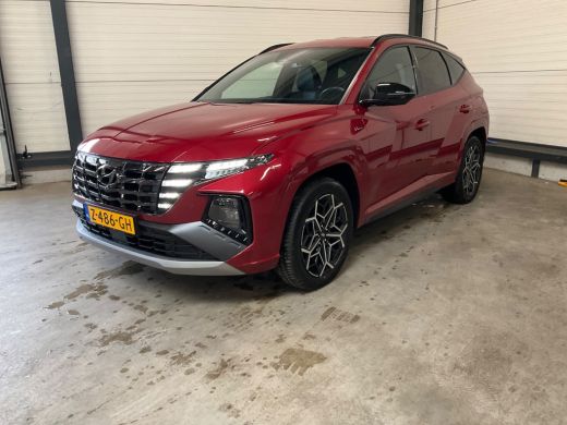 Hyundai Tucson 1.6 T-GDI PHEV N Line 4WD 265pk | Alcantara | Stoelkoeling/verwarming | Elektr. Achterklep | Adap... Hyundai Tucson 1.6 T-GDI PHEV N Line 4WD 265pk | Alcantara | Stoelkoeling/verwarming | Elektr. Achterklep | Adap...
