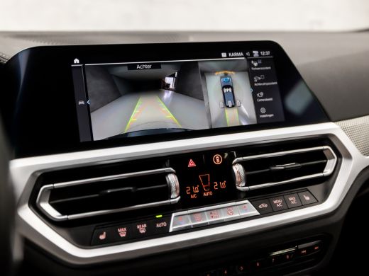 BMW 3 Serie Touring 330e xDrive M Sport 293Pk Automaat (PANORAMADAK, M PAKKET, LASER KOPLAMPEN, MEMORY SEATS,... ActivLease financial lease