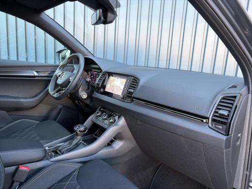 Skoda Karoq 1.5 TSI 150Pk ACT Sportline Business | Trekhaak wegkl. | Elk. A-klep | Camera | Keyless | Adapt. ... ActivLease financial lease