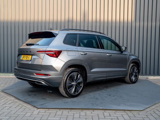 Skoda Karoq 1.5 TSI 150Pk ACT Sportline Business | Trekhaak wegkl. | Elk. A-klep | Camera | Keyless | Adapt. ... ActivLease financial lease