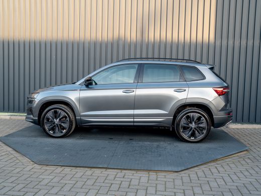 Skoda Karoq 1.5 TSI 150Pk ACT Sportline Business | Trekhaak wegkl. | Elk. A-klep | Camera | Keyless | Adapt. ... ActivLease financial lease