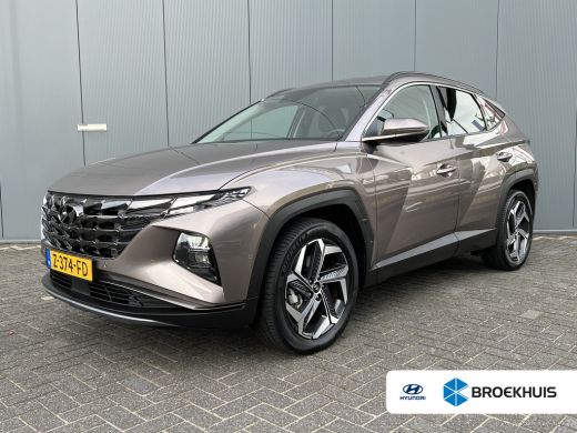 Hyundai Tucson 1.6 T-GDI 265pk PHEV Premium 4WD | Leder | Carplay | Climate | Keyless | Navigatie | Elek. Klep |... Hyundai Tucson 1.6 T-GDI 265pk PHEV Premium 4WD | Leder | Carplay | Climate | Keyless | Navigatie | Elek. Klep |...