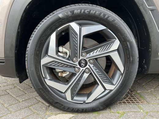 Hyundai Tucson 1.6 T-GDI 265pk PHEV Premium 4WD | Leder | Carplay | Climate | Keyless | Navigatie | Elek. Klep |... ActivLease financial lease