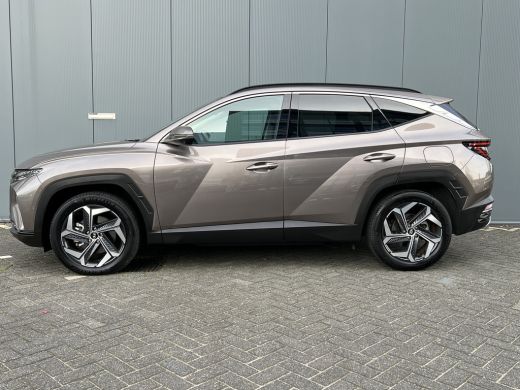 Hyundai Tucson 1.6 T-GDI 265pk PHEV Premium 4WD | Leder | Carplay | Climate | Keyless | Navigatie | Elek. Klep |... ActivLease financial lease
