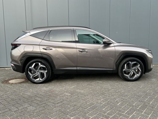 Hyundai Tucson 1.6 T-GDI 265pk PHEV Premium 4WD | Leder | Carplay | Climate | Keyless | Navigatie | Elek. Klep |... ActivLease financial lease