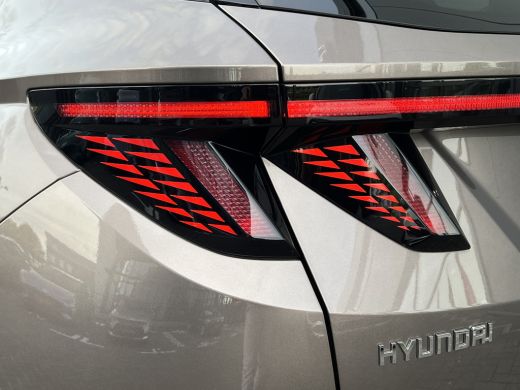 Hyundai Tucson 1.6 T-GDI 265pk PHEV Premium 4WD | Leder | Carplay | Climate | Keyless | Navigatie | Elek. Klep |... ActivLease financial lease