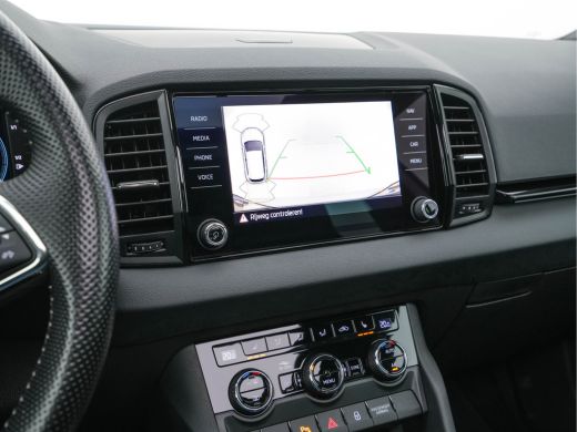 Skoda Karoq 1.5 TSI ACT Sportline (INCL-BTW) Aut. *PANO | DIGI-COCKPIT | ADAPTIVE-CRUISE | FULL-LED | BLIND-S... ActivLease financial lease