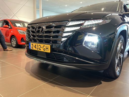 Hyundai Tucson 1.6 T-GDI 265pk PHEV Premium 4WD | Leder | Carplay | Climate | Keyless | Navigatie | Elek. Klep |... ActivLease financial lease