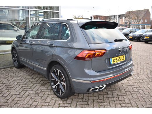 Volkswagen Tiguan R-LINE BUSINESS 1.5 TSI TREKHAAK | PANORAMA. DAK | IQ. LIGHT | APP. CONNECT | NAVIGATIE | STOEL. ... ActivLease financial lease