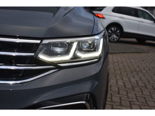 Volkswagen Tiguan R-LINE BUSINESS 1.5 TSI TREKHAAK | PANORAMA. DAK | IQ. LIGHT | APP. CONNECT | NAVIGATIE | STOEL. ... ActivLease financial lease