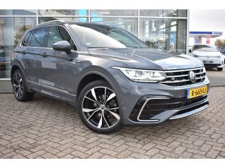 Volkswagen Tiguan R-LINE BUSINESS 1.5 TSI TREKHAAK | PANORAMA. DAK | IQ. LIGHT | APP. CONNECT | NAVIGATIE | STOEL. ...