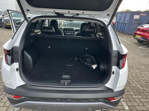 Hyundai Tucson 1.6 T-GDI PHEV Premium Sky 4WD | Stoelverwarming/verkoeling | Stuurverwarming | Schuif-kantel dak... ActivLease financial lease