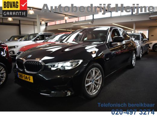BMW 3 Serie 320e 204PK HYBRID BUSINESS LEDER/CAMERA/TREKHAAK