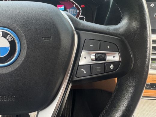 BMW 3 Serie 320e 204PK HYBRID BUSINESS LEDER/CAMERA/TREKHAAK ActivLease financial lease