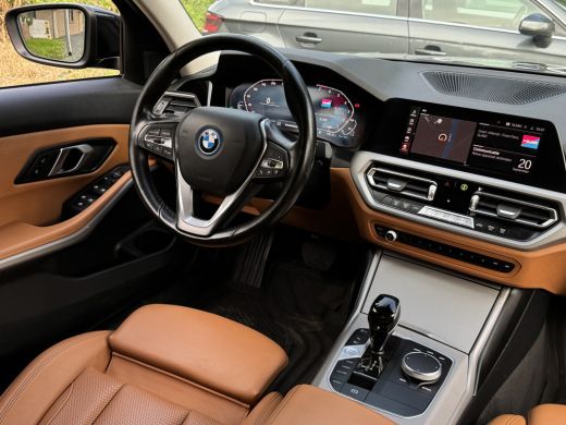 BMW 3 Serie 320e 204PK HYBRID BUSINESS LEDER/CAMERA/TREKHAAK ActivLease financial lease