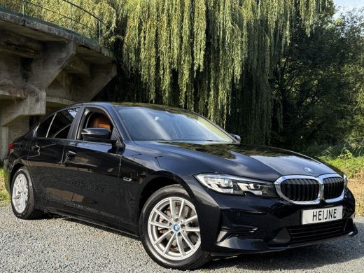 BMW 3 Serie 320e 204PK HYBRID BUSINESS LEDER/CAMERA/TREKHAAK ActivLease financial lease