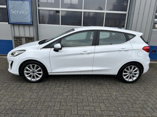 Ford Fiesta 1.0 95PK Titanium | STOEL-, STUUR- EN VOORRUITVERWARMING| NAVIGATIE| CAMERA| ADAPTIVE CRUISE| PAR... ActivLease financial lease