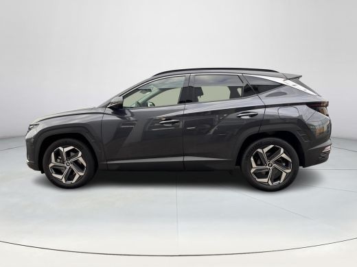 Hyundai Tucson 1.6 T-GDI PHEV Premium 4WD Lederen bekleding | Stoel- en stuurverwarming | 4WD | Navigatiesysteem... ActivLease financial lease