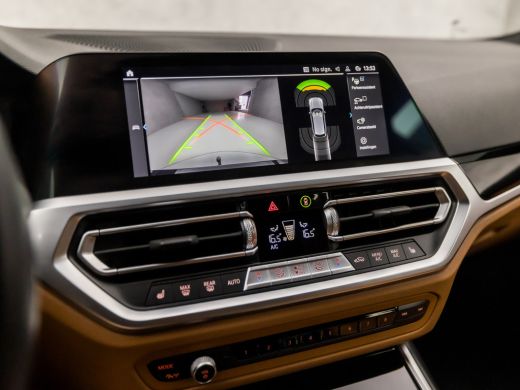 BMW 3 Serie Touring 320e High Executive 204Pk Automaat (APPLE CARPLAY, GROOT NAVI, COGNAC LEDER, TREKHAAK ELE... ActivLease financial lease