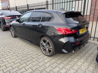 BMW 1 Serie 118i Executive | Achterbank in delen neerklapbaar | Achteruitrijcamera | Alarm klasse 3
