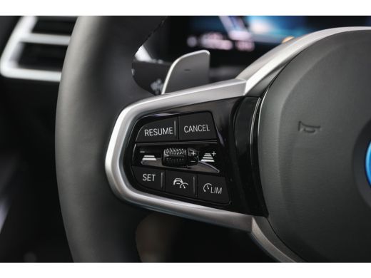 BMW 3 Serie 330e High Executive M Sport Automaat / Schuif-kanteldak / Sportstoelen / M Adaptief onderstel / A... ActivLease financial lease