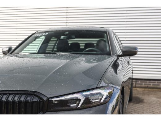 BMW 3 Serie 330e High Executive M Sport Automaat / Schuif-kanteldak / Sportstoelen / M Adaptief onderstel / A... ActivLease financial lease