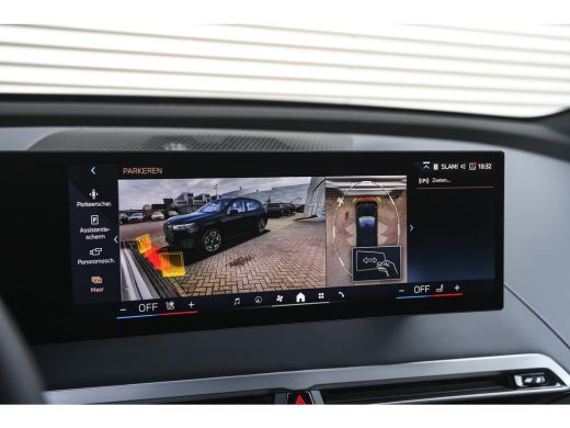 BMW iX xDrive50 High Executive / Panoramadak / Trekhaak / Adaptief onderstel / Soft-Close / Laserlight /... ActivLease financial lease