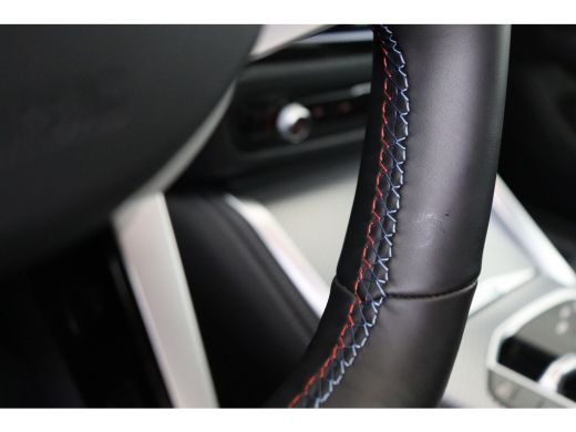 BMW i4 M50 / Schuif-kanteldak / Achteruitrijcamera / M Adaptief onderstel / Adaptieve LED / Stoelverwarm... ActivLease financial lease