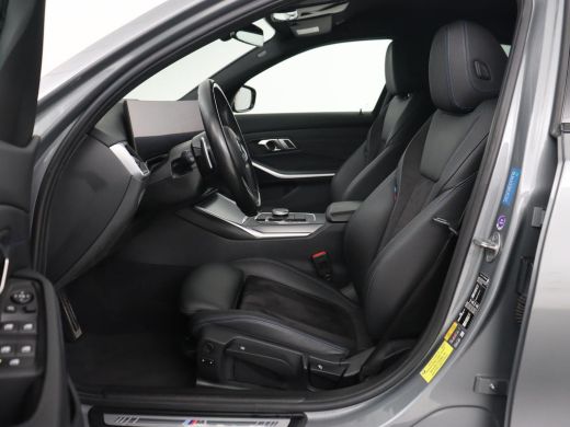 BMW 3 Serie 320e M Sport | Trekhaak | Stoelverwarming | Camera | Leder/Alcantara | Stuurverwarming | Carplay ... ActivLease financial lease