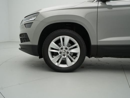 Skoda Karoq 1.0 TSI 115pk Business Edition Plus Navigatie Stoelverwarming Camera Clima Carplay 42 ActivLease financial lease