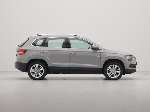 Skoda Karoq 1.0 TSI 115pk Business Edition Plus Navigatie Stoelverwarming Camera Clima Carplay 42 ActivLease financial lease