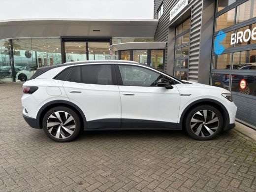 Volkswagen ID.4 First 77 kWh 204 pk | Wegklapbare Trekhaak | Achteruitrijcamera | Apple carplay | ActivLease financial lease