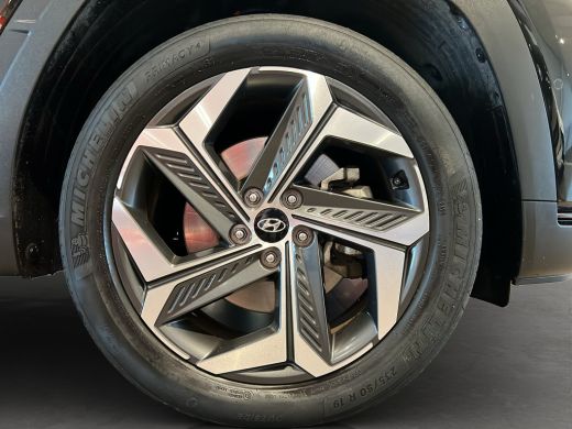 Hyundai Tucson 1.6 T-GDI 265pk PHEV Premium 4WD (299,- p/m Demo Deal!) | Leder | Carplay | Climate | Keyless | N... ActivLease financial lease