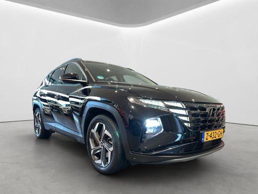 Hyundai Tucson 1.6 T-GDI 265pk PHEV Premium 4WD (299,- p/m Demo Deal!) | Leder | Carplay | Climate | Keyless | N... ActivLease financial lease