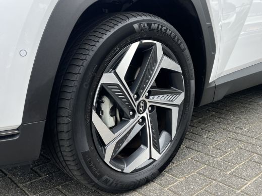 Hyundai Tucson 1.6 T-GDI 265pk PHEV Premium 4WD (299,- p/m Demo Deal!) | Leder | Carplay | Climate | Keyless | N... ActivLease financial lease