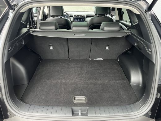 Hyundai Tucson 1.6 T-GDI PHEV 265pk Premium Sky 4WD (299,- p/m Demo Deal!) | Leder | Carplay | Climate | Keyless... ActivLease financial lease