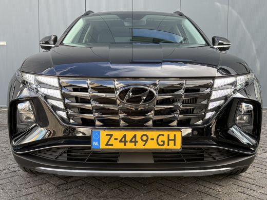 Hyundai Tucson 1.6 T-GDI PHEV 265pk Premium Sky 4WD (299,- p/m Demo Deal!) | Leder | Carplay | Climate | Keyless... ActivLease financial lease