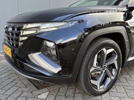 Hyundai Tucson 1.6 T-GDI PHEV 265pk Premium Sky 4WD (299,- p/m Demo Deal!) | Leder | Carplay | Climate | Keyless... ActivLease financial lease