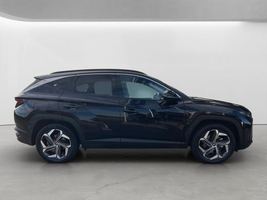 Hyundai Tucson 1.6 T-GDI 265pk PHEV Premium 4WD (299,- p/m Demo Deal!) | Leder | Carplay | Climate | Keyless | N... ActivLease financial lease