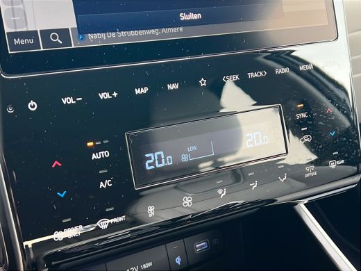 Hyundai Tucson 1.6 T-GDI 265pk PHEV Premium 4WD (299,- p/m Demo Deal!) | Leder | Carplay | Climate | Trekhaak | ... ActivLease financial lease