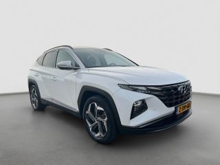 Hyundai Tucson 1.6 T-GDI 265pk PHEV Premium 4WD (299,- p/m Demo Deal!) | Leder | Carplay | Climate | Trekhaak | ...