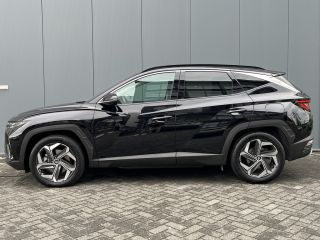 Hyundai Tucson 1.6 T-GDI 265pk PHEV Premium Sky 4WD (299,- p/m Demo Deal!) | Leder | Carplay | Climate | Keyless...